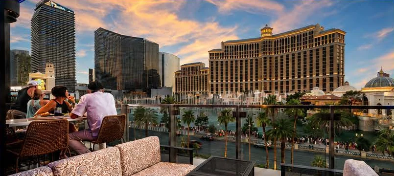 Rooftop Deck tables overlooking the Bellagio and the Las Vegas Strip