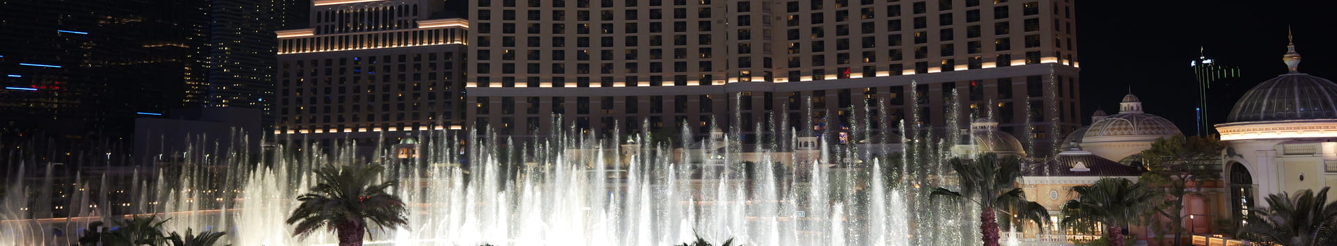 Bellagio Hotel with its illuminated fountains dancing at night in Las Vegas